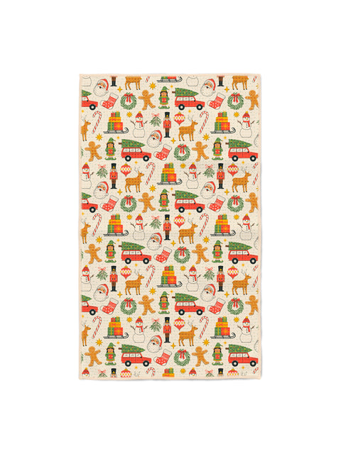 Christmas Vibes kitchen tea towel with Santa, snowmen, nutcrackers, reindeer and gingerbread on cream