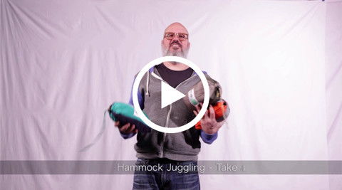 Person juggling Trek Light hammocks, starring in 'Hammock Juggling - Take 4.' Fun and creative use of Trek Light gear.