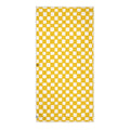 Yellow checkered Desert Dreams Wander & Travel Towel, quick-dry, sand-resistant, made from recycled materials, with hanging loop.
