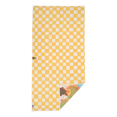 Checkered yellow towel by Trek Light with artistic corner detail, perfect for outdoor adventures and travel gear.