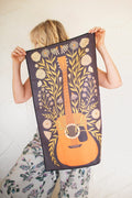Dinner Music Kitchen & Tea Towel featuring guitars and flowers, perfect for any home-cooked meal.