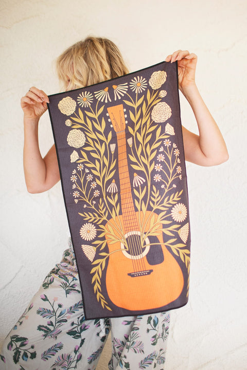 Dinner Music Kitchen & Tea Towel featuring guitars and flowers, perfect for any home-cooked meal.