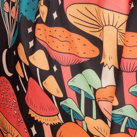 Trek Light Double Hammock Midnight Mushroom print fabric depicting colorful mushrooms on a black background.