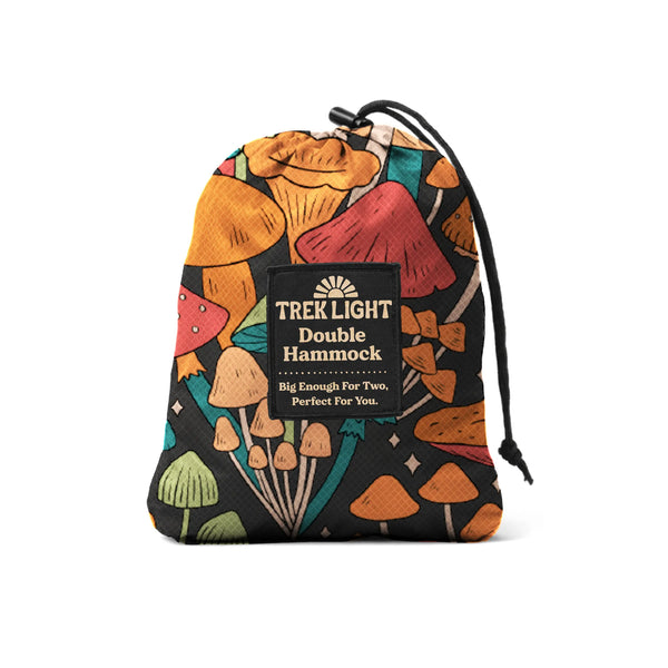 Trek Light double hammock packed in a colorful mushroom-patterned bag, big enough for two, ideal for outdoor adventures.