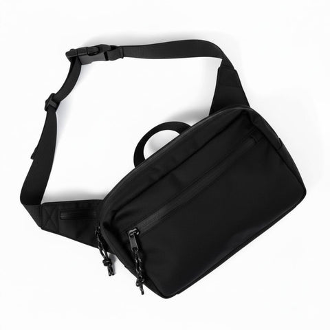 Everyday Fanny Pack (Eclipse) with multiple zippered pockets and adjustable strap, ideal for travel and daily use.
