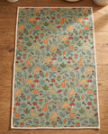 Fall Harvest waffle kitchen tea towel reverse side laid flat: sage-green with pumpkins, gourds, leaves and birds