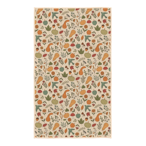 Fall Harvest kitchen tea towel reverse side on cream background with pumpkins, gourds, mushrooms, acorns, autumn leaves and