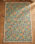 Fall Harvest waffle kitchen tea towel reverse side laid flat: sage-green with pumpkins, gourds, leaves and birds