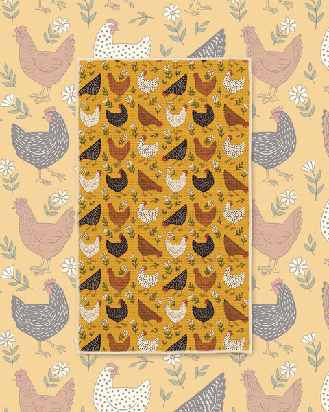 Farmhouse Chicken Kitchen & Tea Towel with brown and black chickens among small yellow flowers on a mustard background