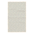 Reverse side of the Floral Trout kitchen tea towel showing a scattered blue flower and leaf pattern with a hanging loop and
