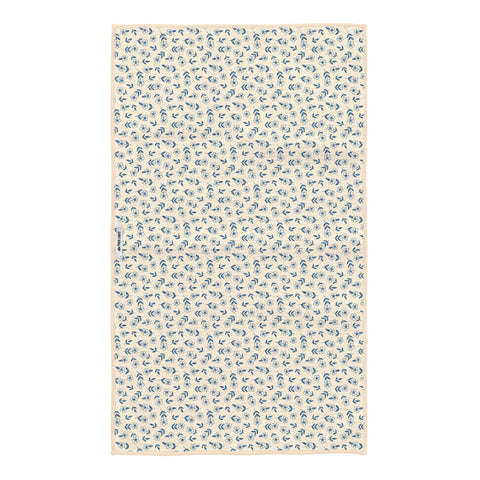 Reverse side of the Floral Trout kitchen tea towel showing a scattered blue flower and leaf pattern with a hanging loop and