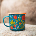 Garden Buzz Enamel Mug 16oz featuring vibrant flowers and bees, perfect for outdoor adventures by Trek Light.