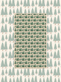 Gondola Winter tea towel laid over a matching cream ski resort pattern of mountains, gondolas, and pines