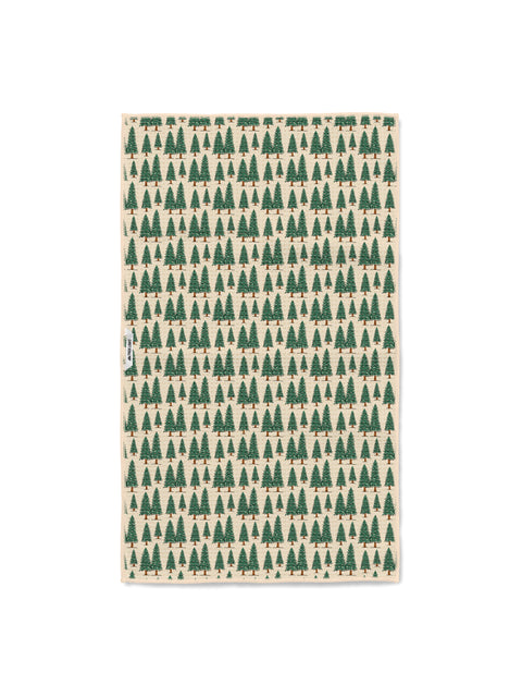 Gondola Winter kitchen tea towel with red gondolas, blue mountains, and green pine trees on a cream ski slope pattern