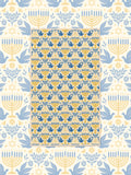Gold and blue menorah, dove, and Star of David tea towel on cream Hanukkah-themed backdrop