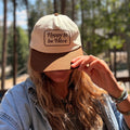 Happy To Be Here Hat being worn outdoors, showcasing its stylish design and adjustable fit.