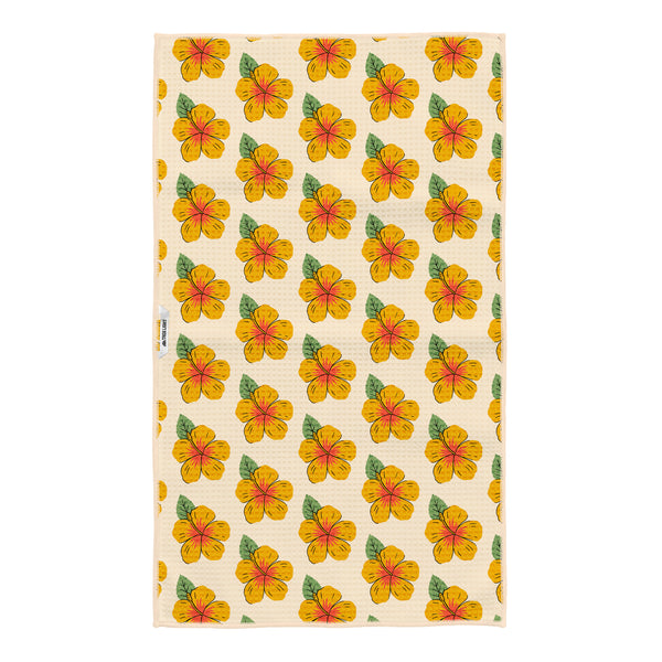 Reverse side of the Hawaii kitchen tea towel with a repeating yellow and orange hibiscus flower pattern on cream Grip-Tex