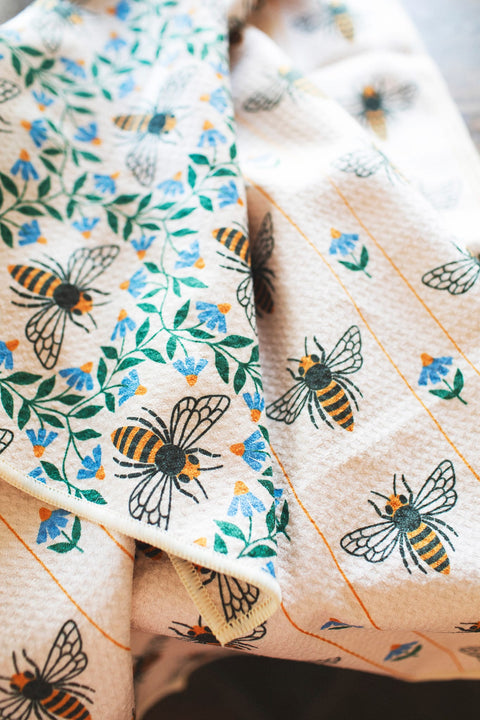 Honey Bee Kitchen & Tea Towel featuring vibrant bee and floral designs for eco-friendly kitchen use.