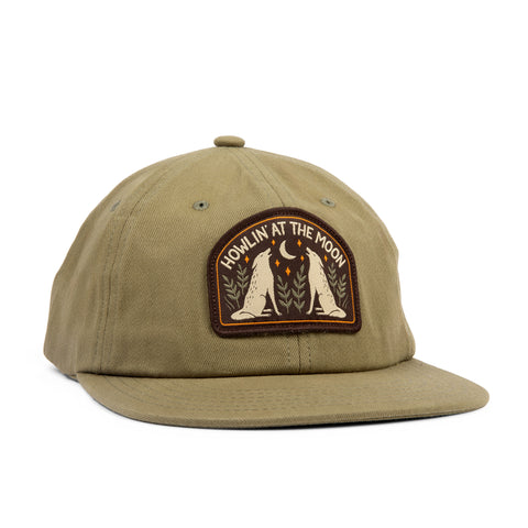 Howlin' At The Moon Hat by Trek Light, olive green cap with unique patch design for outdoor enthusiasts and wild explorers.