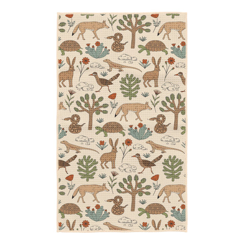 Joshua Tree kitchen tea towel in cream with hand-drawn desert animals including coyotes, rabbits, tortoises, lizards.
