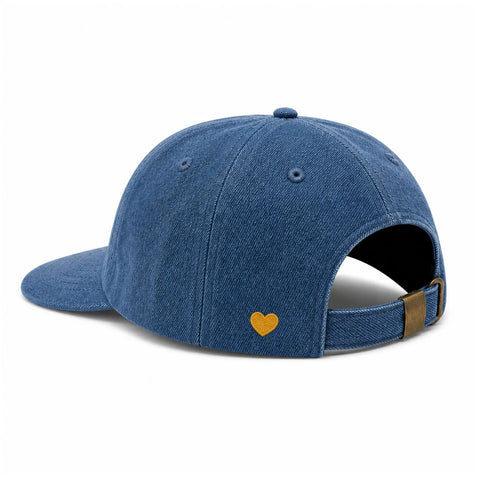 Mama Hat in blue denim with gold heart detail, designed for comfort and style, adjustable fit for everyday wear.