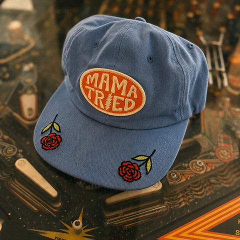 Mama Tried Hat featuring blue fabric with embroidered roses, designed for comfort and style.