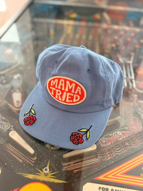 Mama Tried Hat featuring blue fabric with embroidered roses, designed for comfort and style.