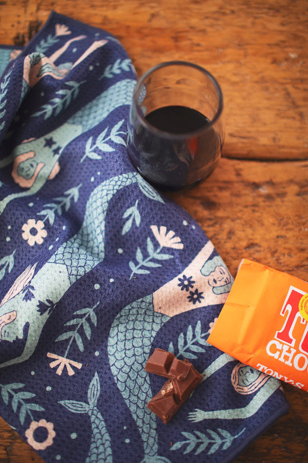 Mermaids Kitchen & Tea Towel with a glass of wine and chocolate