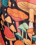 Close-up of the Double Hammock in Midnight Mushroom Print, colorful mushrooms and stars on black fabric.