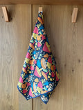 Midnight Mushroom Kitchen & Tea Towel hanging, showcasing vibrant double-sided design with eco-friendly, super absorbent Grip-Tex™ fabric.