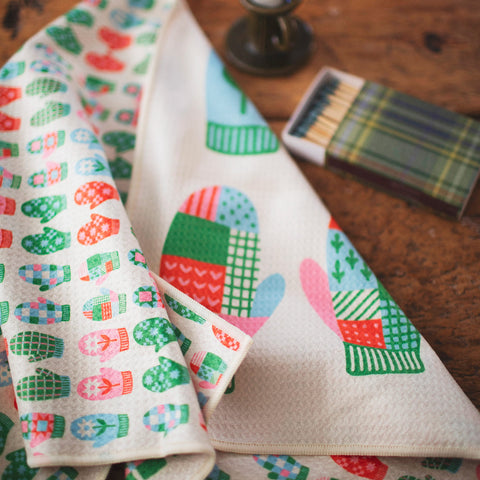 Colorful Mittens Kitchen & Tea Towel with vibrant patterns, made from 100% recycled materials, eco-friendly and quick-drying.