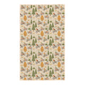 Beige kitchen towel with illustrated mountain bikers riding among green pine trees, aspen trees, and wildflowers
