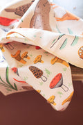 Oregon Kitchen & Tea Towel showcasing colorful mushroom patterns, eco-friendly and super absorbent for versatile kitchen use.
