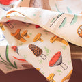 Oregon Kitchen & Tea Towel showcasing colorful mushroom patterns, eco-friendly and super absorbent for versatile kitchen use.