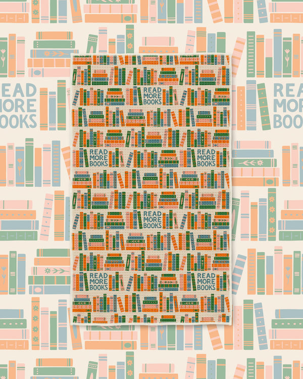 Read More Books Kitchen & Tea Towel with stacked books and the words Read More Books in orange, green and cream