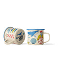 Salty Seas Enamel Mug in cream with a blue rim and nautical prints of a whale, shells, lighthouse and sailor, on white.