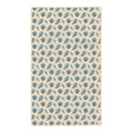 Reverse side of Salty Seas kitchen tea towel with blue scallop shell, oyster and clam pattern on cream, Trek Light logo tag