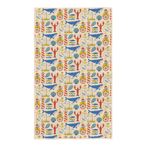 Salty Seas kitchen tea towel with colorful nautical print: blue whales, red lobsters, lighthouses, sailboats, seagulls