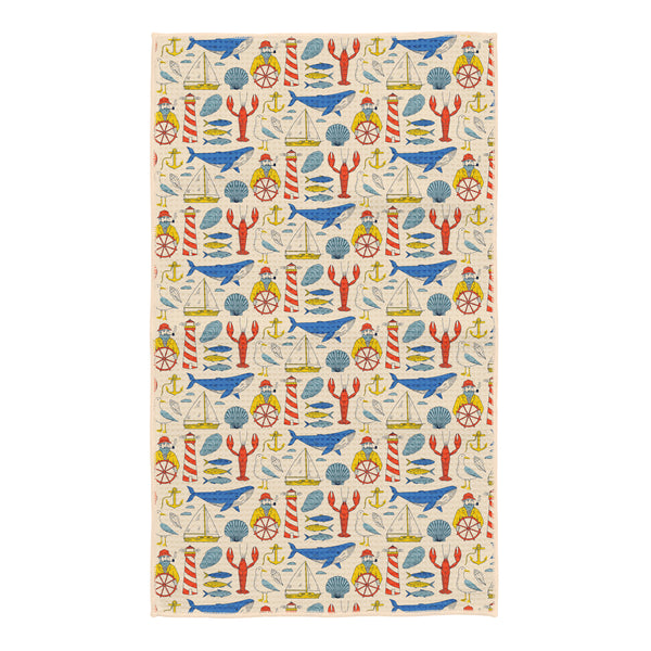 Salty Seas kitchen tea towel with colorful nautical print: blue whales, red lobsters, lighthouses, sailboats, seagulls