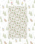 Snow Day Kitchen & Tea Towel with skiers, sledders and green pine trees on a white background
