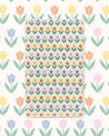 Spring Tulips Kitchen & Tea Towel with rows of tulips in red, yellow, pink and blue on cream