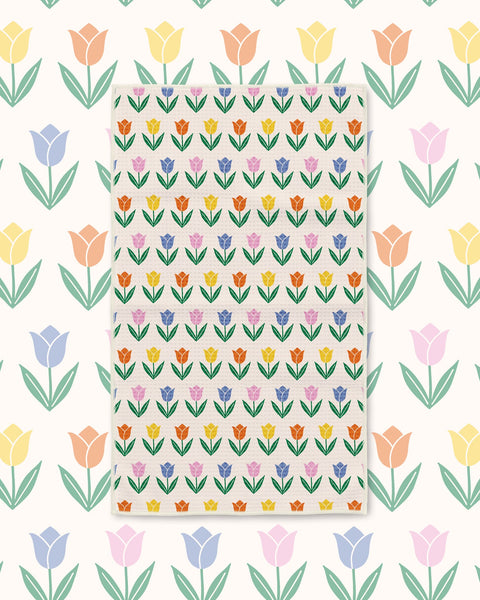 Spring Tulips Kitchen & Tea Towel with rows of tulips in red, yellow, pink and blue on cream