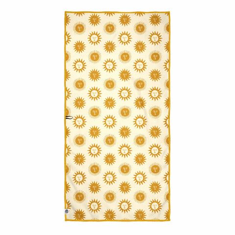 Sunny Wander & Travel Towel with sun pattern design, quick-dry and sand-resistant, made from 100% recycled materials.