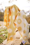 Sunny Wander & Travel Towel featuring a vibrant sunshine design, perfect for any travel adventure.