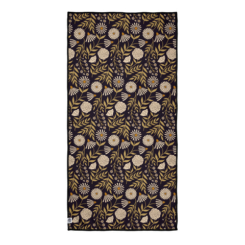 Travelin' Light Wander & Travel Towel with floral pattern, sand-resistant and quick-drying, made from recycled materials.