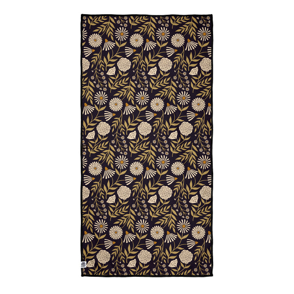 Travelin' Light Wander & Travel Towel with floral pattern, sand-resistant and quick-drying, made from recycled materials.