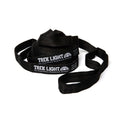 Portable Trek Light Go Anywhere Hammock Straps coiled and ready for adventure, lightweight and easy to use, perfect for any journey.