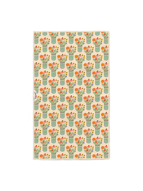Cream kitchen tea towel with repeating pattern of wildflowers in mint mason jars