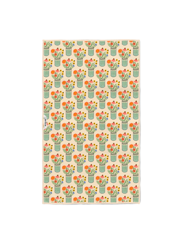 Cream kitchen tea towel with repeating pattern of wildflowers in mint mason jars