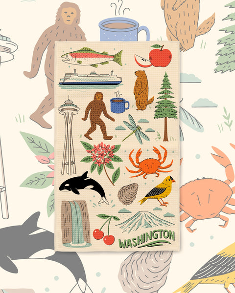 Washington Kitchen & Tea Towel with Washington icons like the Space Needle, orca, ferry, salmon and crab on cream